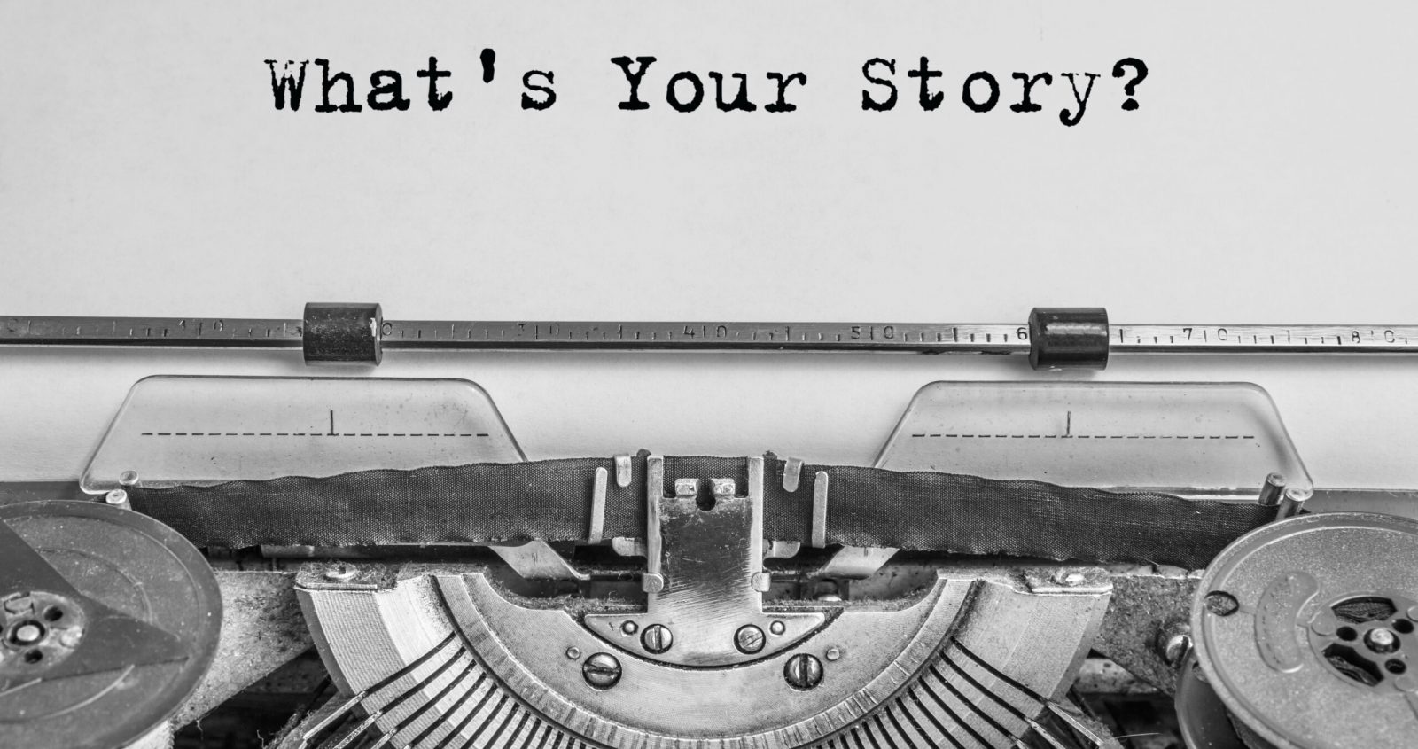 what's your story? The text is typed on paper with an old typewriter, a vintage inscription, a story of life.